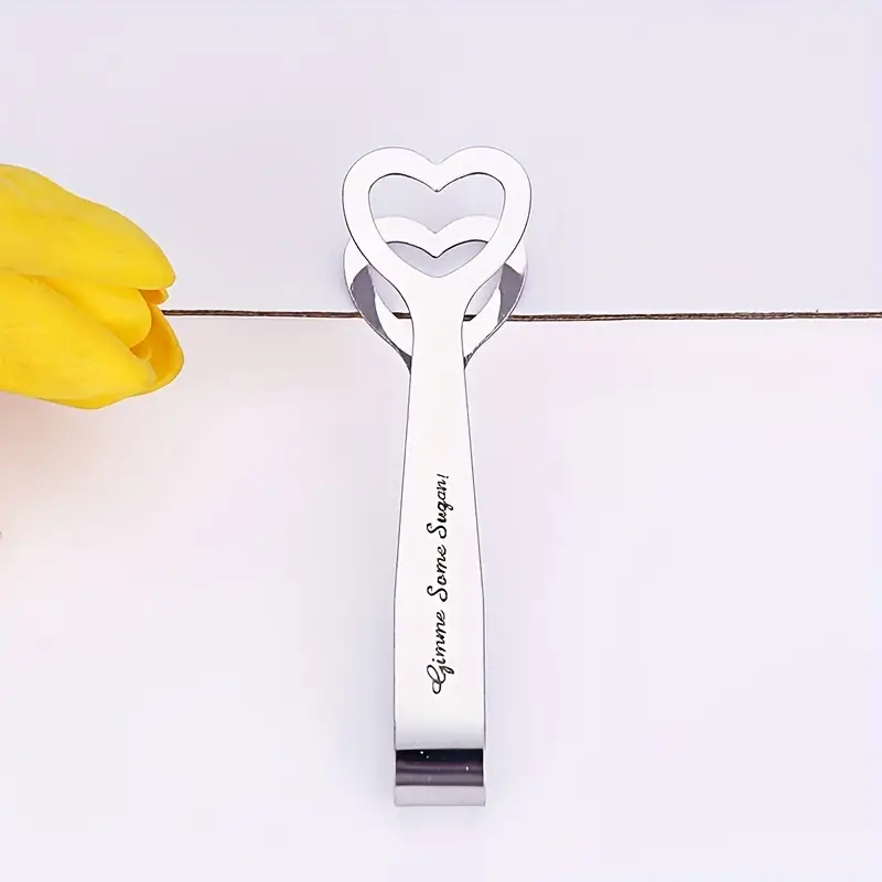 Pinza de acero inoxidable ergonómica para servir con estilo único